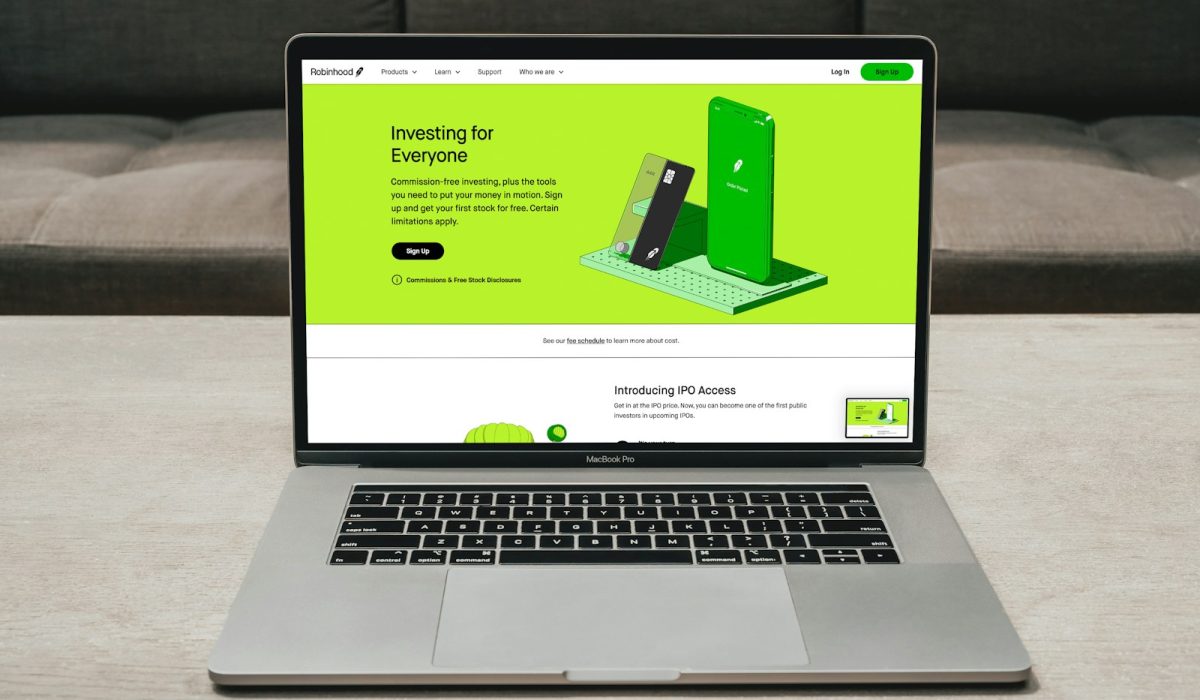 a laptop computer sitting on top of a table